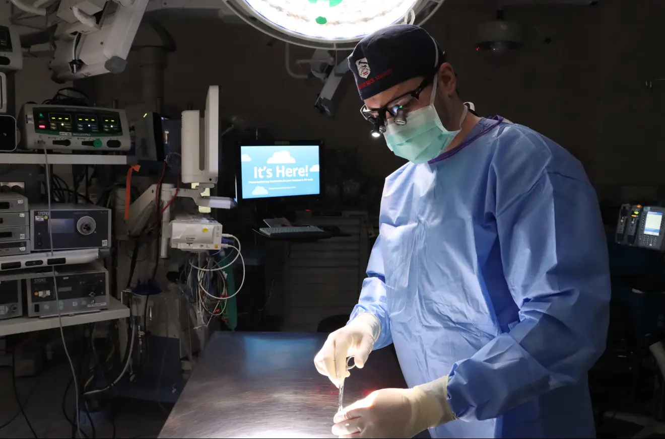 Dr. Tyler Okland performing facial plastic surgery